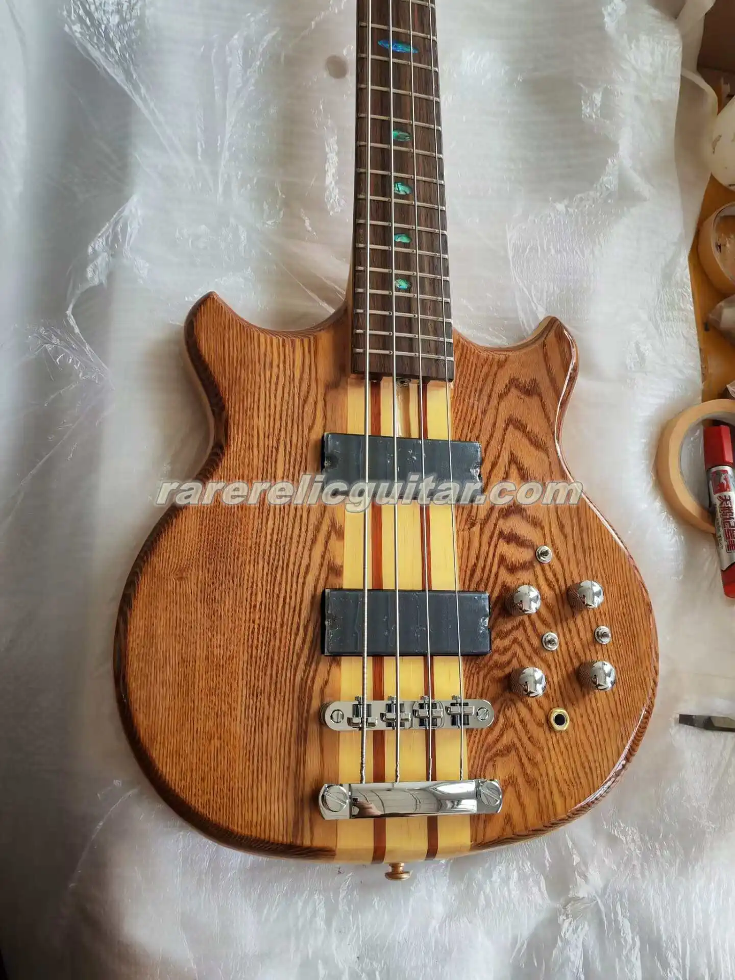 

Rare Natural Ash Body 4 Strings Electric Bass Guitar Neck Through Body 5 Plies Neck Abalone Inlay Chrome Hardware