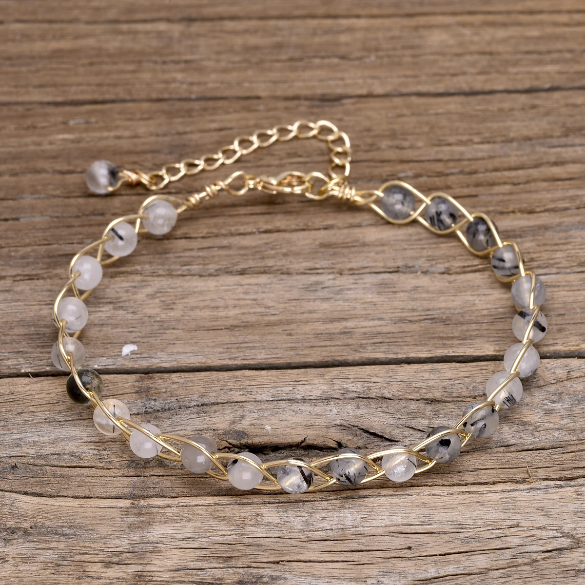 Tourmalinated quartz beaded bracelet close-up