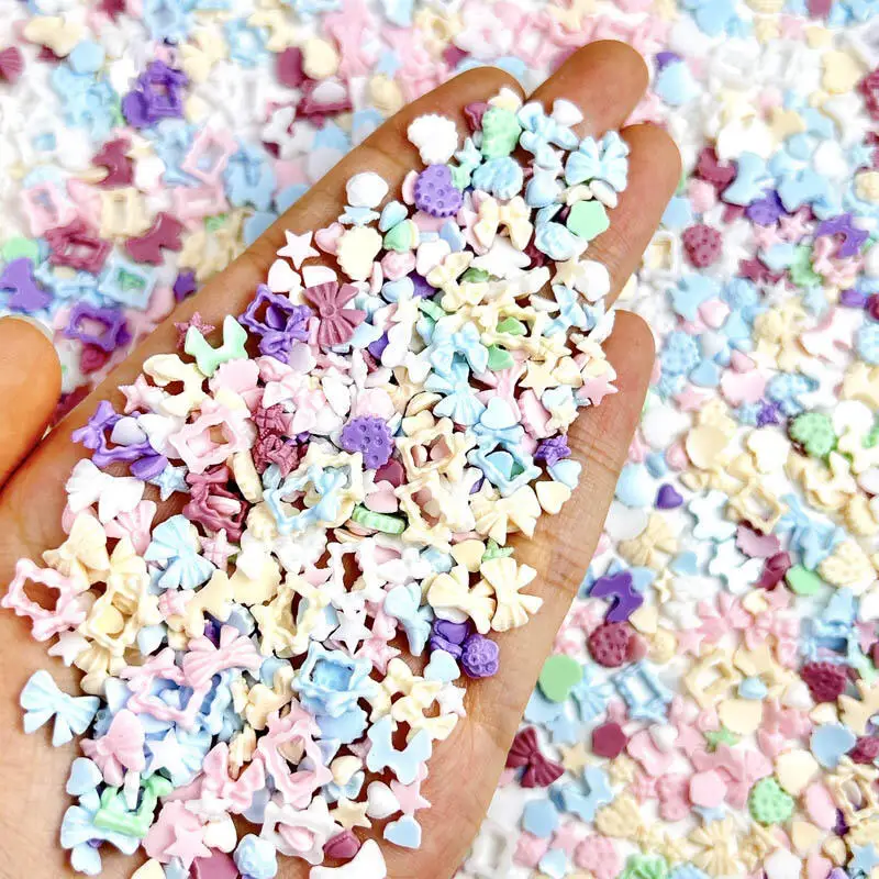 50PCS 3D 마카롱 하트 보우 네일 매력 수지 나비 꽃 네일 아트 장식 액세서리 DIY 매니큐어 공예품
