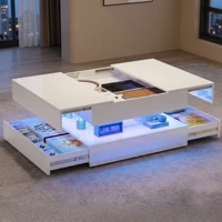 Table basse carrée blanche Comanlai avec finition brillante, dotée d'un éclairage d'ambiance LED à changement de couleur contrôlé via une application mobile 1