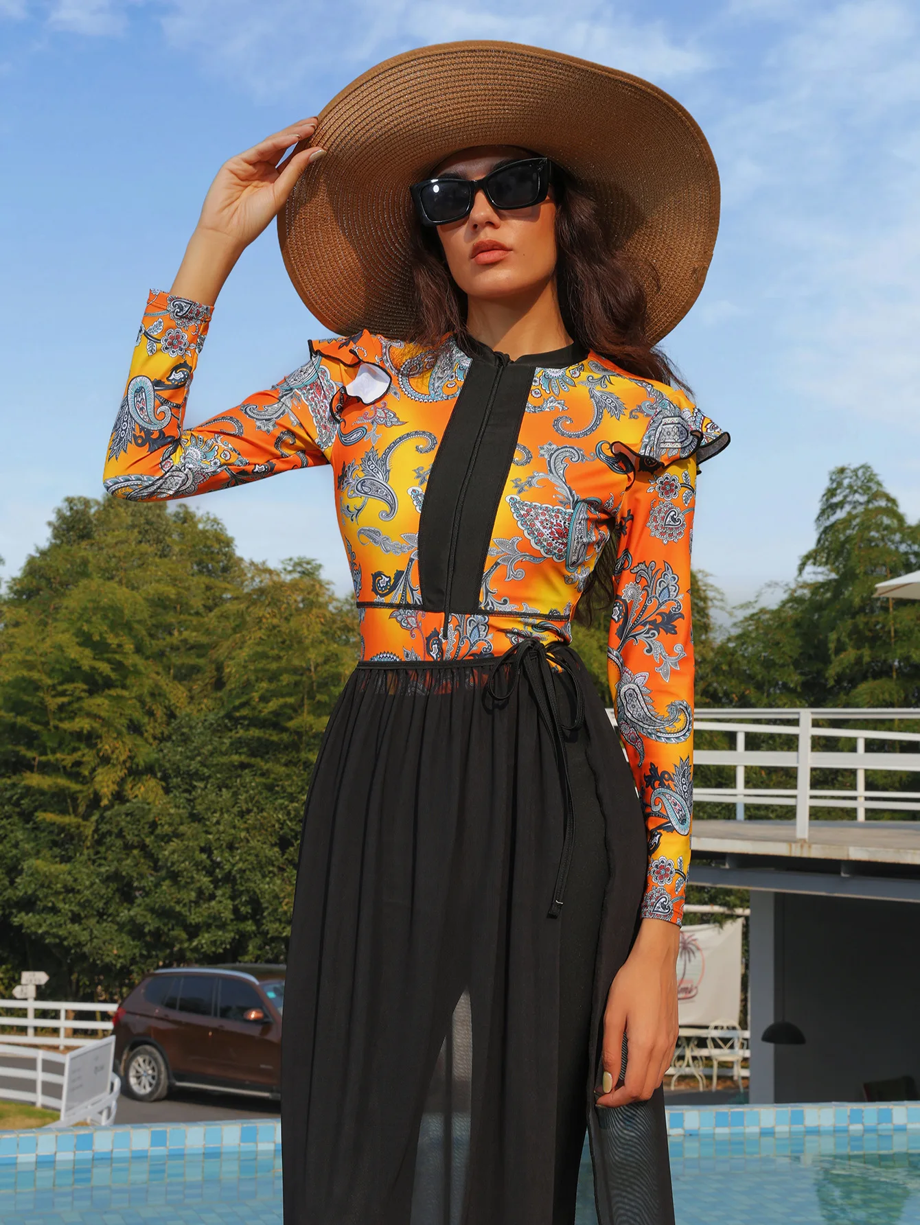 Islamic swimwear set styled with beach hat and sunglasses for summer vacation