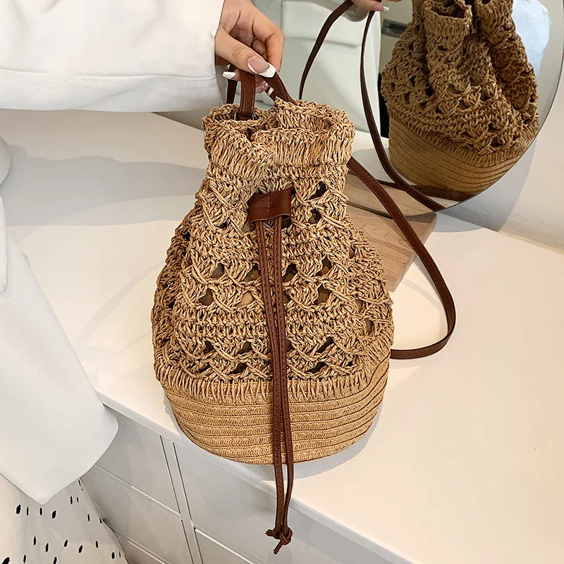Handmade Women's Summer Straw Beach Shoulder Bag Woven Hollow Drawstring Shoulder Bags Knitted Fashion Female Design Travel Tote