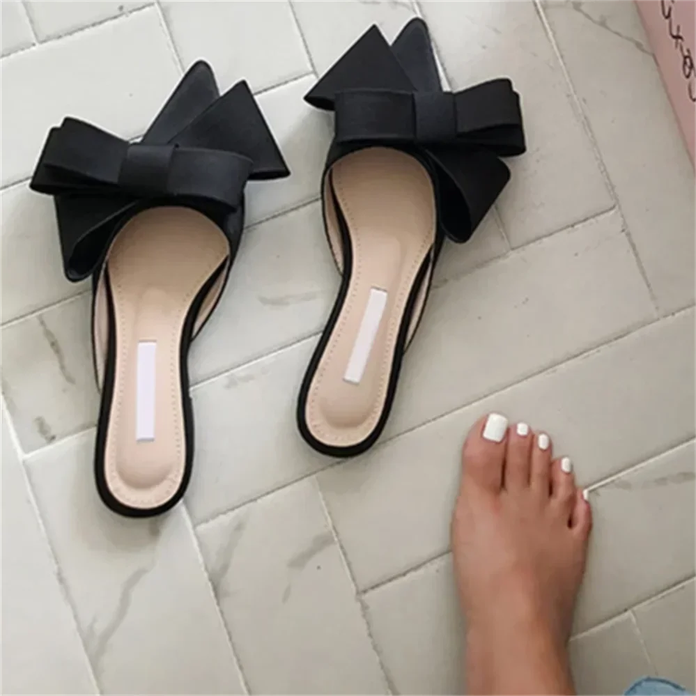 

New Korean style Silk satin Pointed Baotou half slippers women's 2024 spring and summer bow, flat heel Muller shoes large ladies