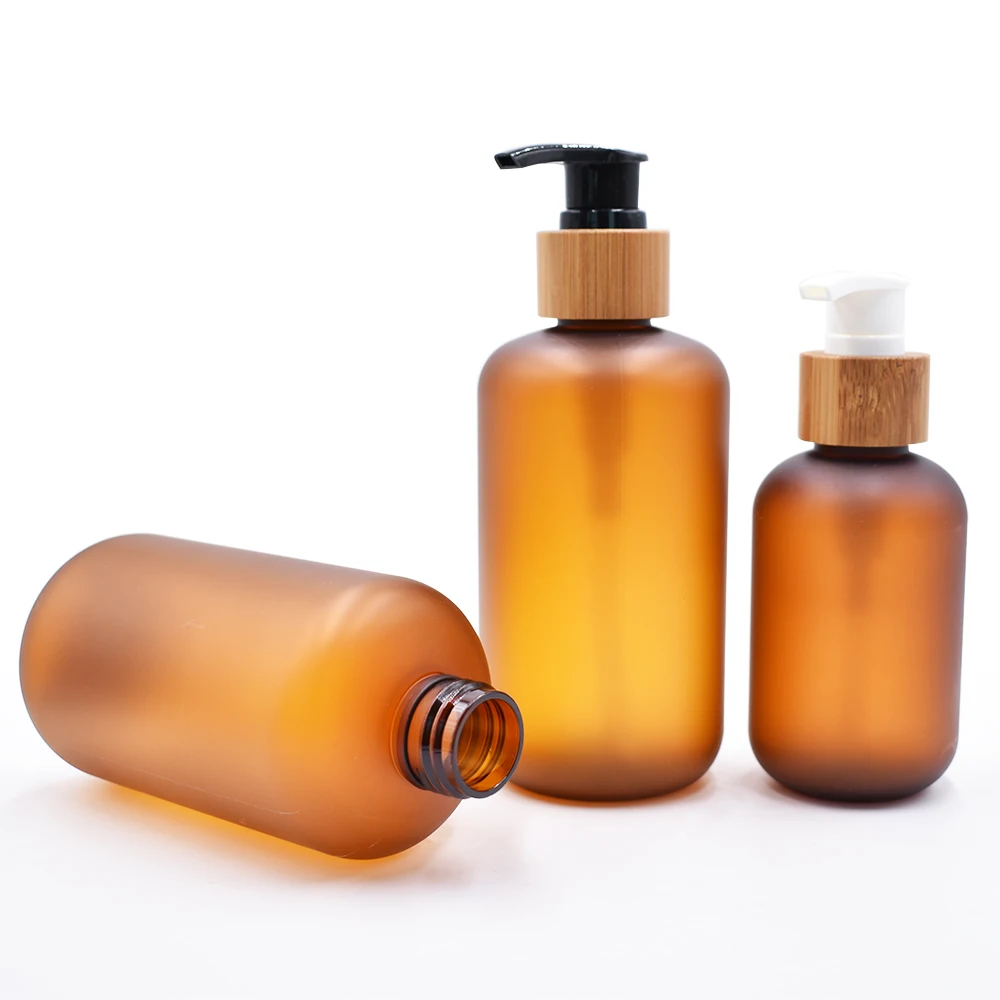 

Wholesale Amber Plastic Bottles Jars ,Containers With Bamboo Cap For Shampoo, Lotions, Liquid Body Soap Packaging For Cosmetics