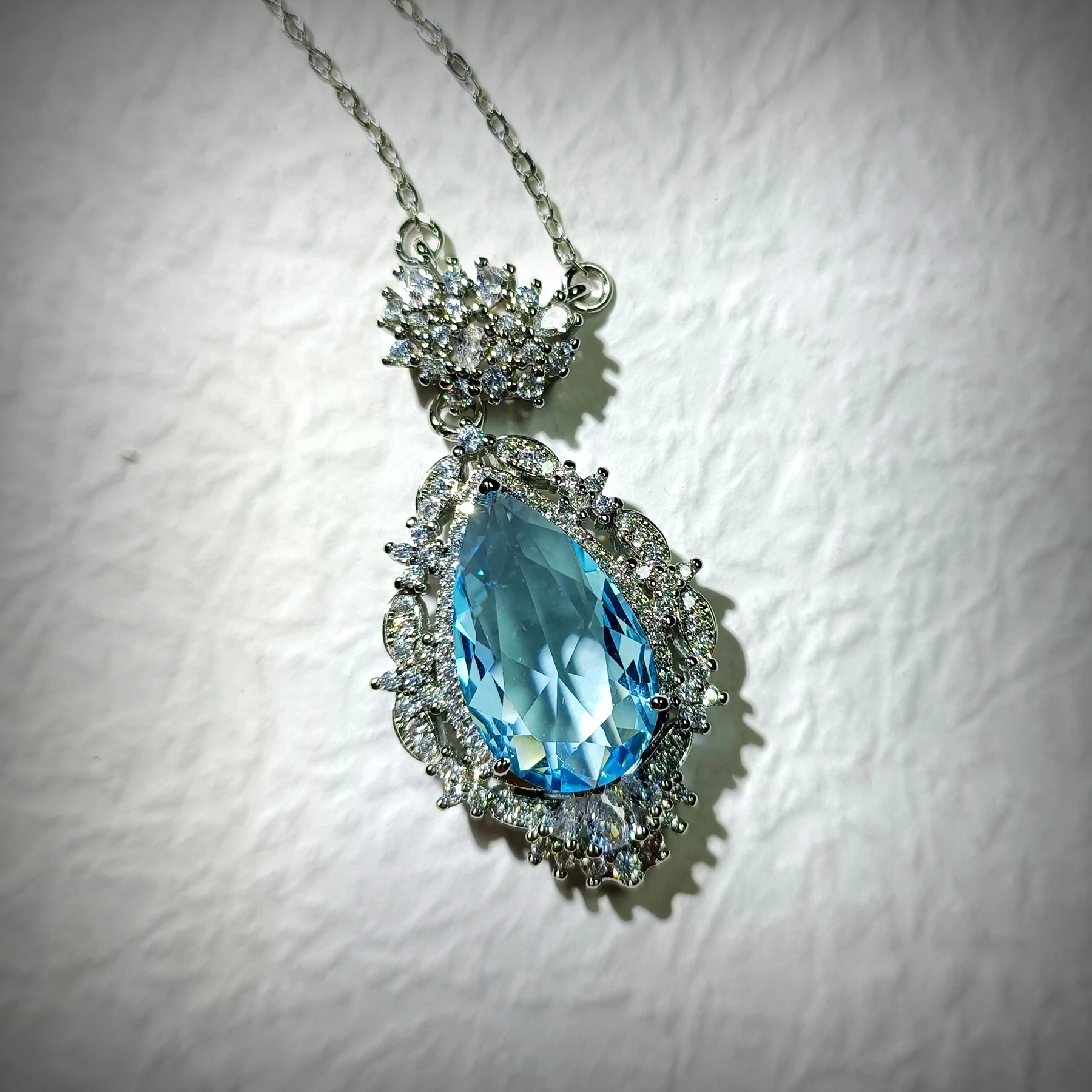 Glamorous Silver Tone Art Deco Ornate Cluster Halo Blue Pear Drop Pendant Necklace Ethereal Jewelry