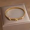 Classic Stainless Steel Metal Cross Geometric Bracelet for Women Elegant Letter Bangles Rust-proof Wrist Jewelry 1