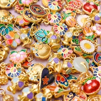 10 pièces alliage huile dégoulinant plaqué or émail pendentifs fleur sourire Lotus papillon charme bijoux à bricoler soi-même faisant collier Bracelets 2