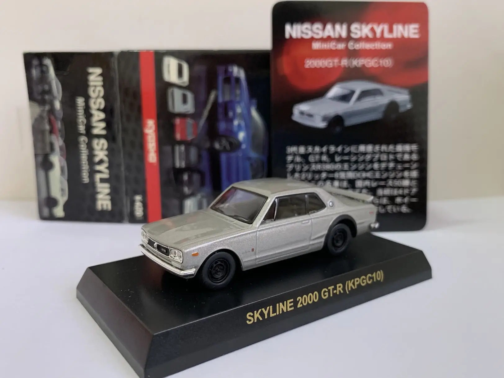 

1/64 KYOSHO Nissan Skyline 2000 first generation KPGC10 God of War Collect die casting alloy assembled trolley model