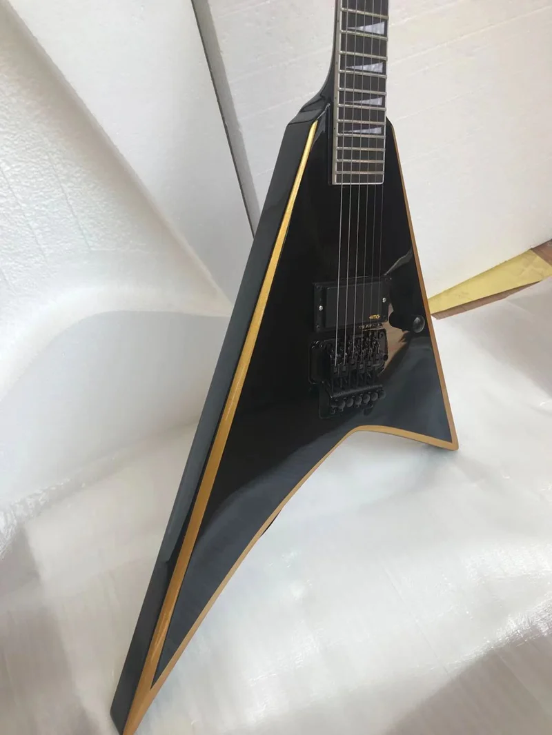 Custom 6string Vshaped electric guitar Black body with gold binding Tremolo bridge free delivery