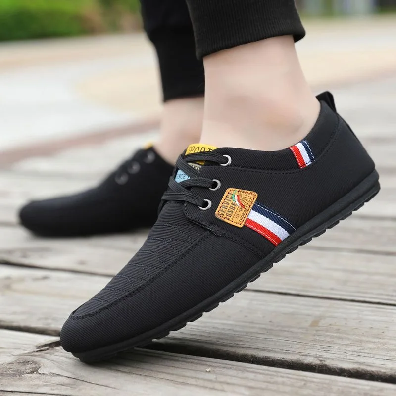 

Hot Men Casual Shoes Brand Breathable British Mens Sneakers 2023 Fashion Lace Up Soft Flats Driving Shoes White Black Peas Shoes