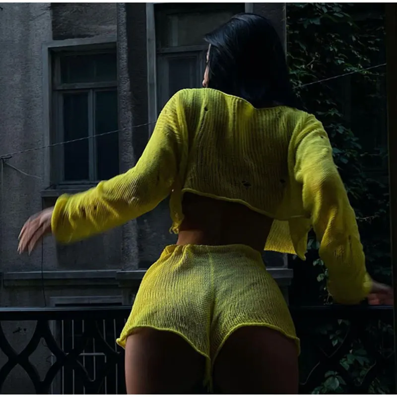  width=800></p>
<h1>SPECIFICATIONS</h1>
<p><span>Brand Name</span>: <span style=color:#333>Lovely Ran</span></p>
<p><span>Age</span>: <span style=color:#333>MIDDLE AGE</span></p>
<p><span>Material</span>: <span style=color:#333>POLYESTER</span></p>
<p><span>Material</span>: <span style=color:#333>Viscose</span></p>
<p><span>Elasticity</span>: <span style=color:#333>Slight Strech</span></p>
<p><span>Fabric Type</span>: <span style=color:#333>Knitted</span></p>
<p><span>Style</span>: <span style=color:#333>Beach Style</span></p>
<p><span>Pattern Type</span>: <span style=color:#333>Solid</span></p>
<p><span>Fit Type</span>: <span style=color:#333>LOOSE</span></p>
<p><span>Season</span>: <span style=color:#333>Summer</span></p>
<p><span>Decoration</span>: <span style=color:#333>Lace-up</span></p>
<p><span>Decoration</span>: <span style=color:#333>hollow out</span></p>
<p><span>Decoration</span>: <span style=color:#333>HOLE</span></p>
<p><span>Decoration</span>: <span style=color:#333>Hand frayed</span></p>
<p><span>Gender</span>: <span style=color:#333>WOMEN</span></p>
<p><span>Release Date</span>: <span style=color:#333>Spring 2023</span></p>
<p><span>Clothing Patterns</span>: <span style=color:#333>LOOSE</span></p>
<p><span>Clothing Length</span>: <span style=color:#333>short</span></p>
<p><span>Model Number</span>: <span style=color:#333>Shorts Sets Women</span></p>
<p><span>Place Of Origin</span>: <span style=color:#333>China (mainland)</span></p>
<p><span>Pant Length(cm)</span>: <span style=color:#333>shorts</span></p>
<p><span>Fabric content</span>: <span style=color:#333>51% (inclusive) – 70% (inclusive)</span></p>
<p><span>Collar</span>: <span style=color:#333>O-Neck</span></p>
<p><span>Closure Type</span>: <span style=color:#333>Pullover</span></p>
<p><span>Sleeve Style</span>: <span style=color:#333>regular</span></p>
<p><span>Material Composition</span>: <span style=color:#333>synthetic fiber</span></p>
<p><span>Pant Style</span>: <span style=color:#333>regular</span></p>
<p><span>Origin</span>: <span style=color:#333>Mainland China</span></p>
<p><span>CN</span>: <span style=color:#333>Zhejiang</span></p>
<p><span>Pant Closure Type</span>: <span style=color:#333>Drawstring</span></p>
<p><span>Sleeve Length(cm)</span>: <span style=color:#333>Full</span></p>
<p><span>Support</span>: <span style=color:#333>Wholesale & Drop Shipping</span></p>
<p><span>39/250</span>: <span style=color:#333>5-11/62</span></p>
<p><span>Sexy Beach See Through Crop Top Shorts Sets</span>: <span style=color:#333>Women Knit Long Sleeve Lace Up Female Suit</span></p>
<p><span>2023 Summer Holiday Womens 2 Piece Set</span>: <span style=color:#333>beach holiday</span></p>
<p>“</p>
			</div>
					<div class=