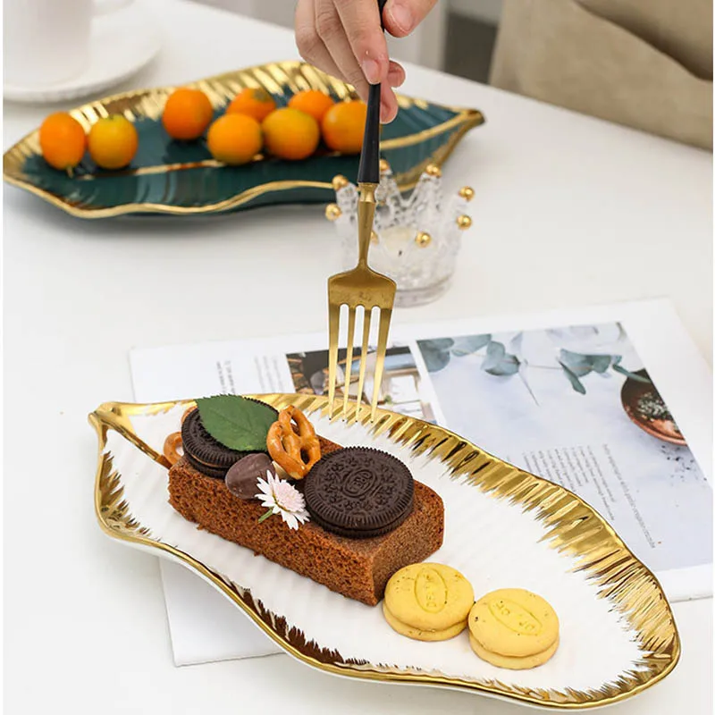 

Роскошный Золотой лоток в виде банановых листьев, керамическая тарелка для фруктов и тортов, десертная тарелка для хранения ювелирных изделий, столовая посуда для хранения