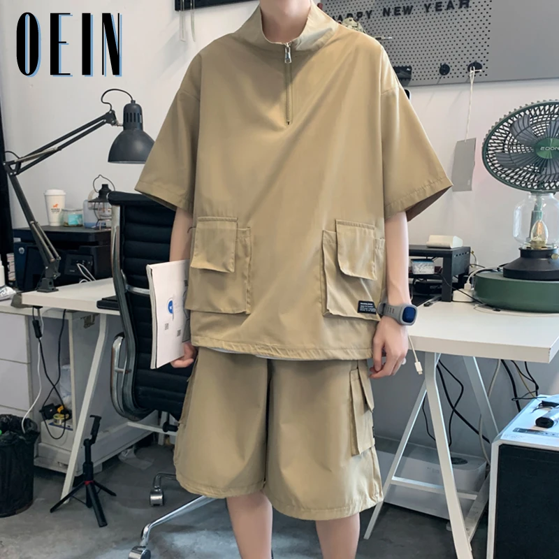 

Летние свободные однотонные футболки и шорты в стиле Харадзюку для пар, уличные комплекты, мужской повседневный спортивный костюм на молнии с высоким воротником и карманами