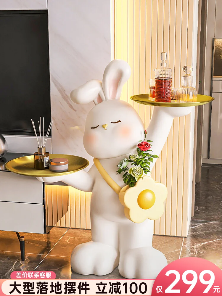 

Large cute rabbit floor ornaments, living room TV cabinet, storage shelves, cream wind edges, several home decorations