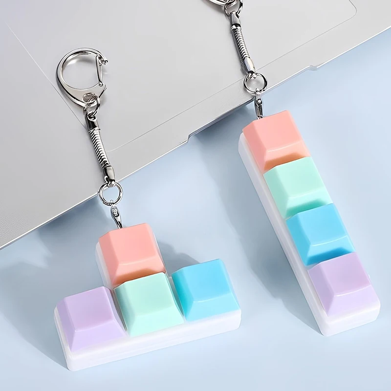 Kreative Dekompressions-Tastatur mit Macaron-förmigen Tastenkappen, Dekompressions-Schlüsselanhängern und kleinen Spielzeuganhängern – Detail 9