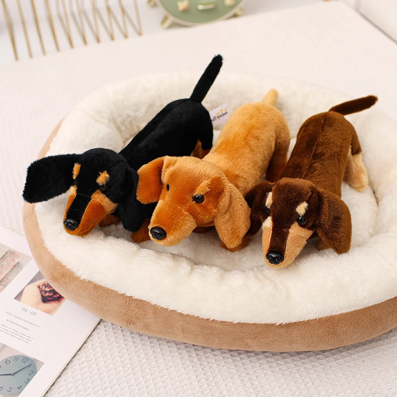 Black and tan stuffed dog plush detail