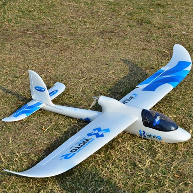 Planeur RC 2.4GHz 3CH gyroscope en atterrissage, kit bleu, vue arrière.
