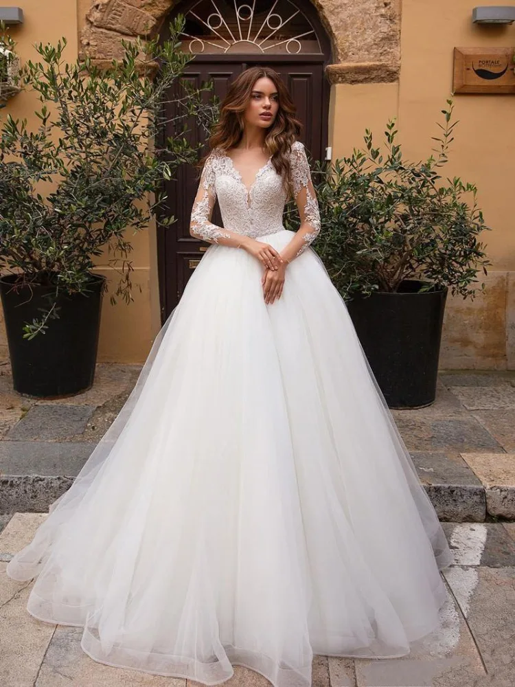 Elegant Sheer O-Neck Wedding Dresses Long Sleeve Illusion Button Back Applique Floor Length A Line Bride Gowns Vestido De Novia