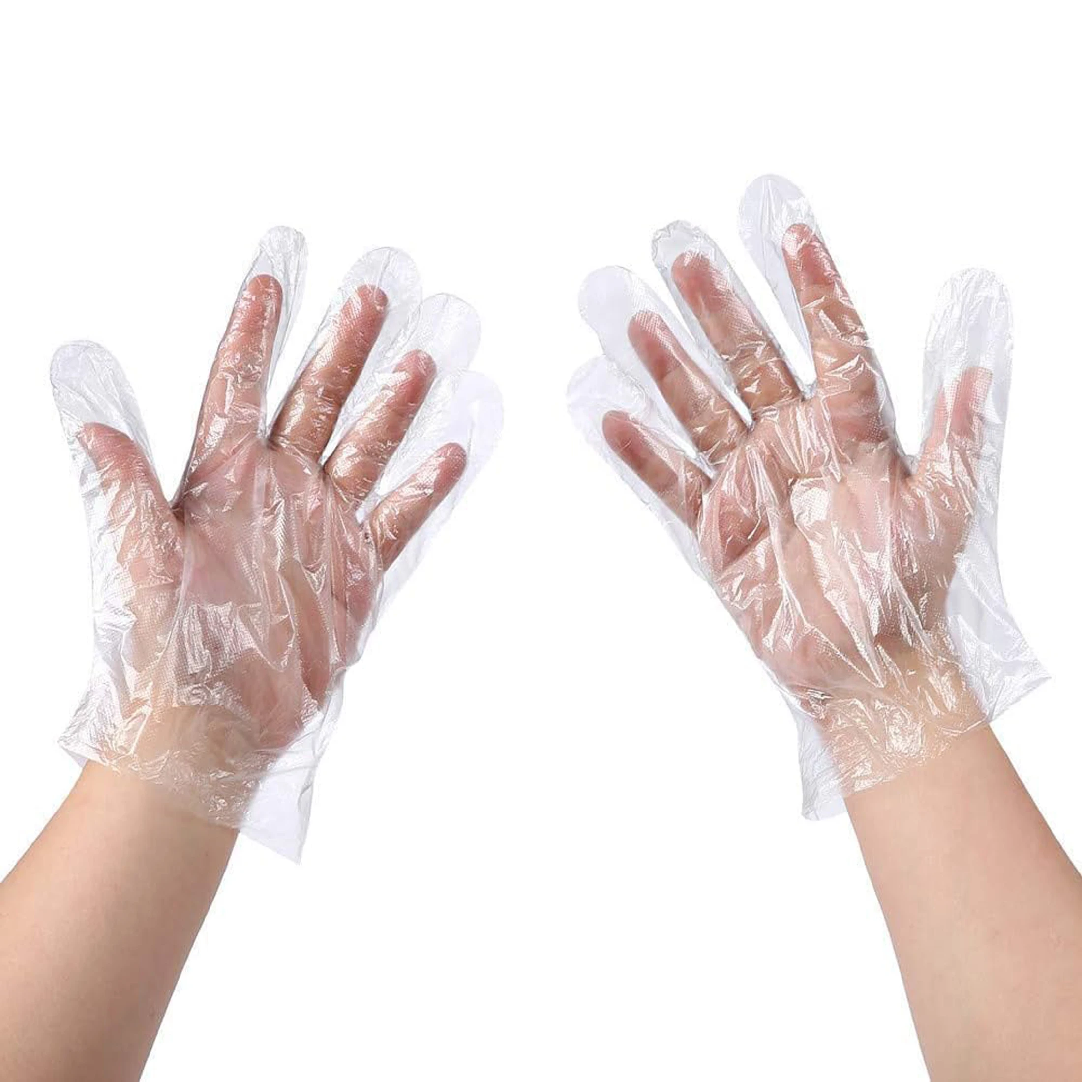 Gants vinyle jetables alimentaires en lot de 100 pièces, transparents et sans BPA, posés sur une surface propre.