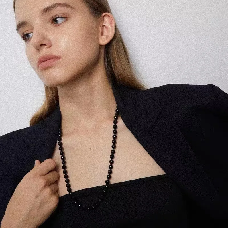 

Natural black onyx sweater chain niche design simple fashion hand-knotted long necklace women
