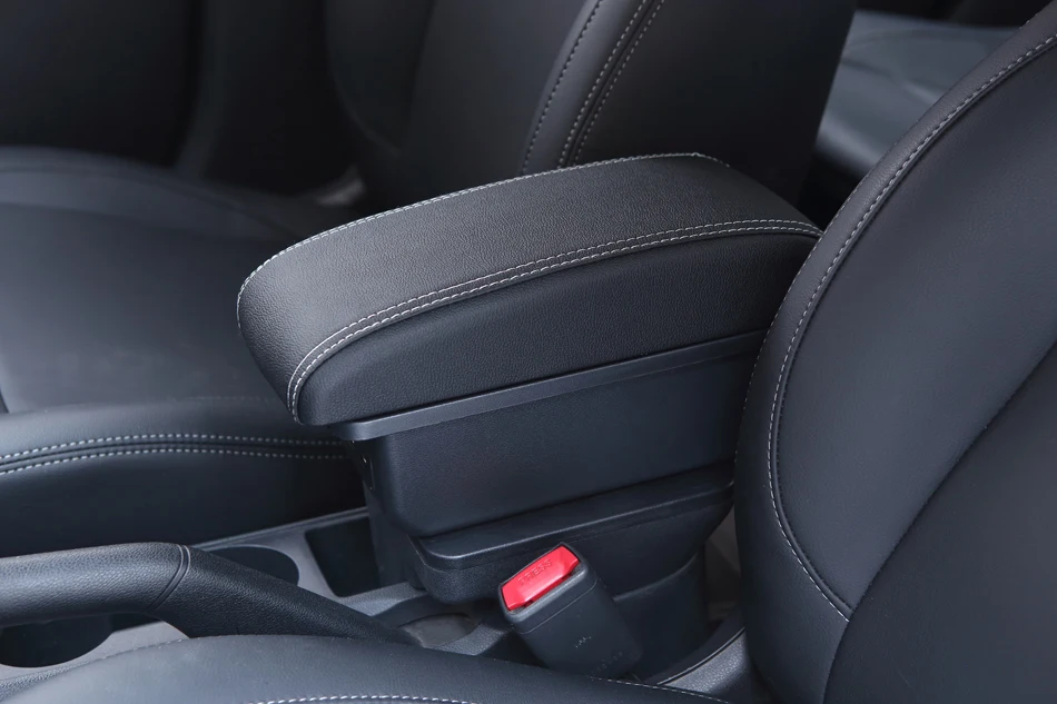 Musta käsinoja valkoisilla saumoilla