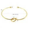 MEDFOLY Adjustable Gold Bangle Bracelet for Women 14K Gold Plated Forever Love Knot Infinity Bangle Bracelets Jewelry Gift 2
