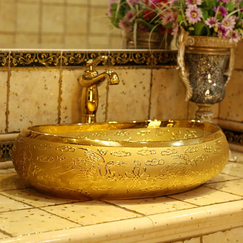 

China Artistic Handmade Art wash basin Ceramic Counter Top ceramic wash basins oval shape golden carved bathroom sinks