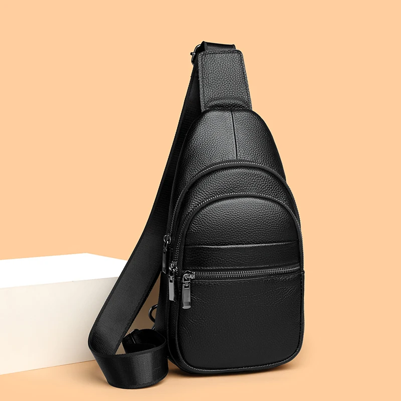 Stylish genuine leather sling bag for men with multiple compartments, ideal for everyday carry or travel