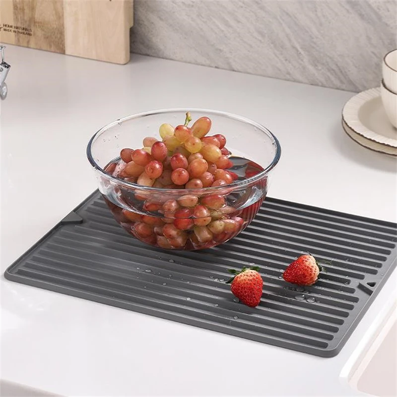 https://ae01.alicdn.com/kf/S56c858023c43440eb4a764fcaa7d2813W/Dish-Drying-Mat-Drainer-Mat-Protection-Heat-Resistant-Counter-Top-Mat-Sink-Non-Slip-Dish-Draining.jpg