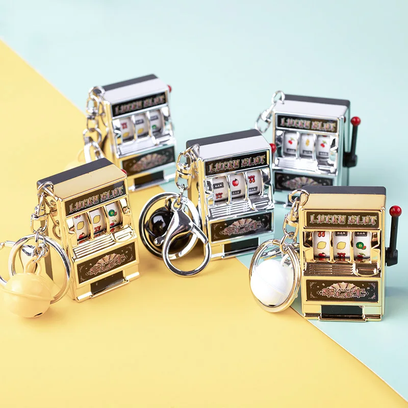 

1pcs Mini Zwirling Cartoon Fruit Machine Creative Lottery Machine Keychain Gift Coin-operated Game Gambling Simulation Machine