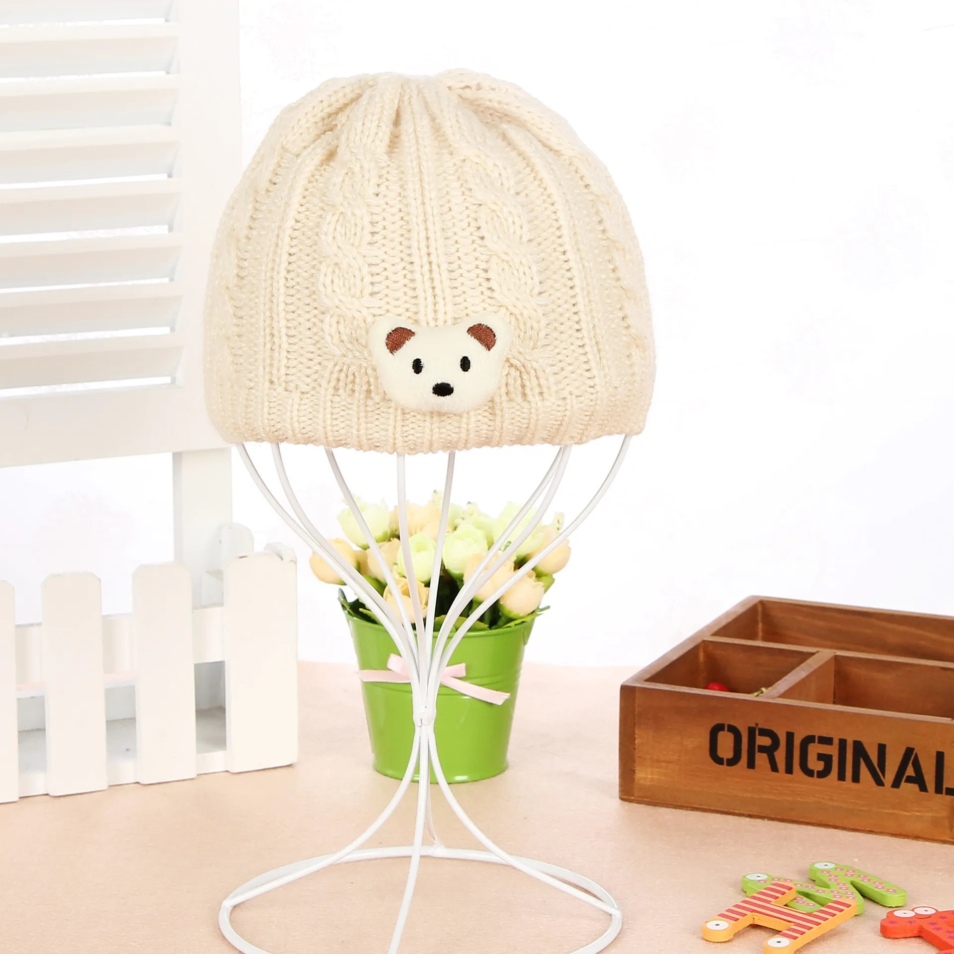 Рисунок 6 - Детская вязаная шапка с мягким помпоном