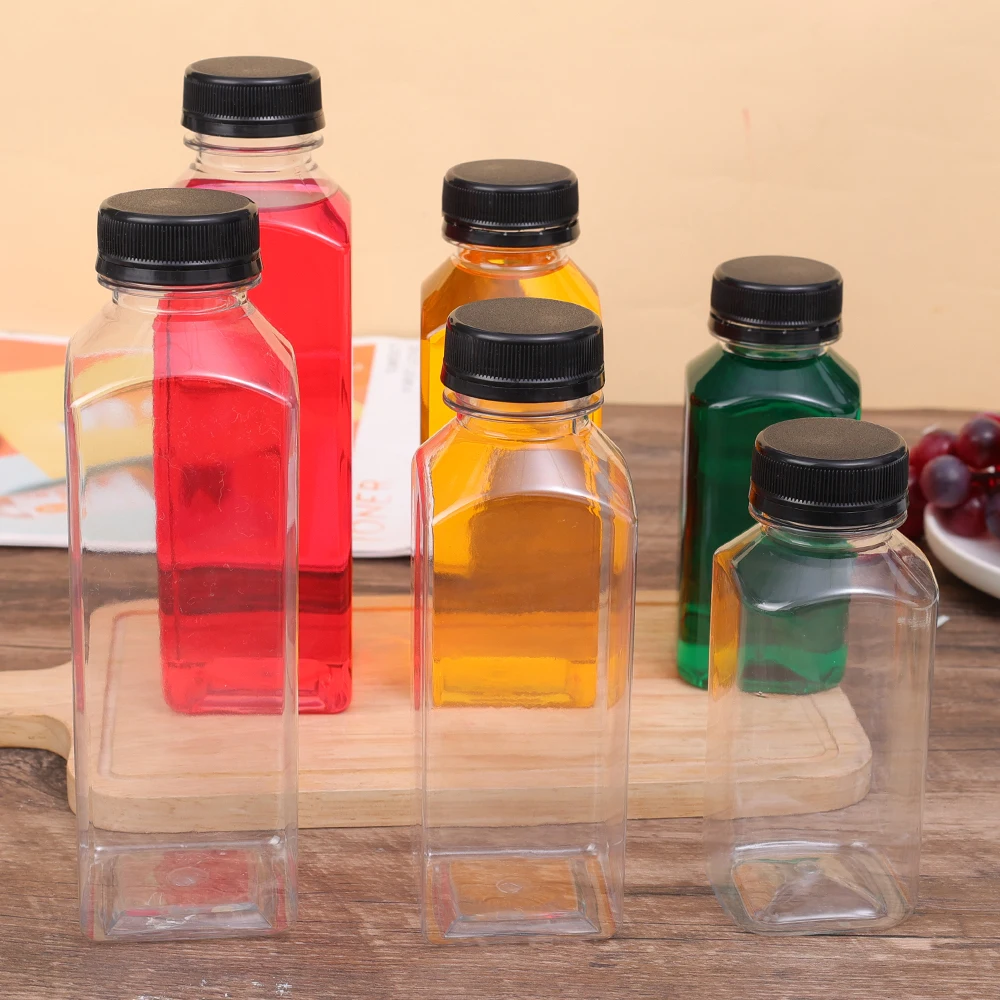 Absovetu Confezione da 4 bottiglie in vetro con coperchio, ermetiche, 500 ml, riutilizzabili, per conservare il latte con coperchio, bottiglie quadrate in vetro per l'acqua