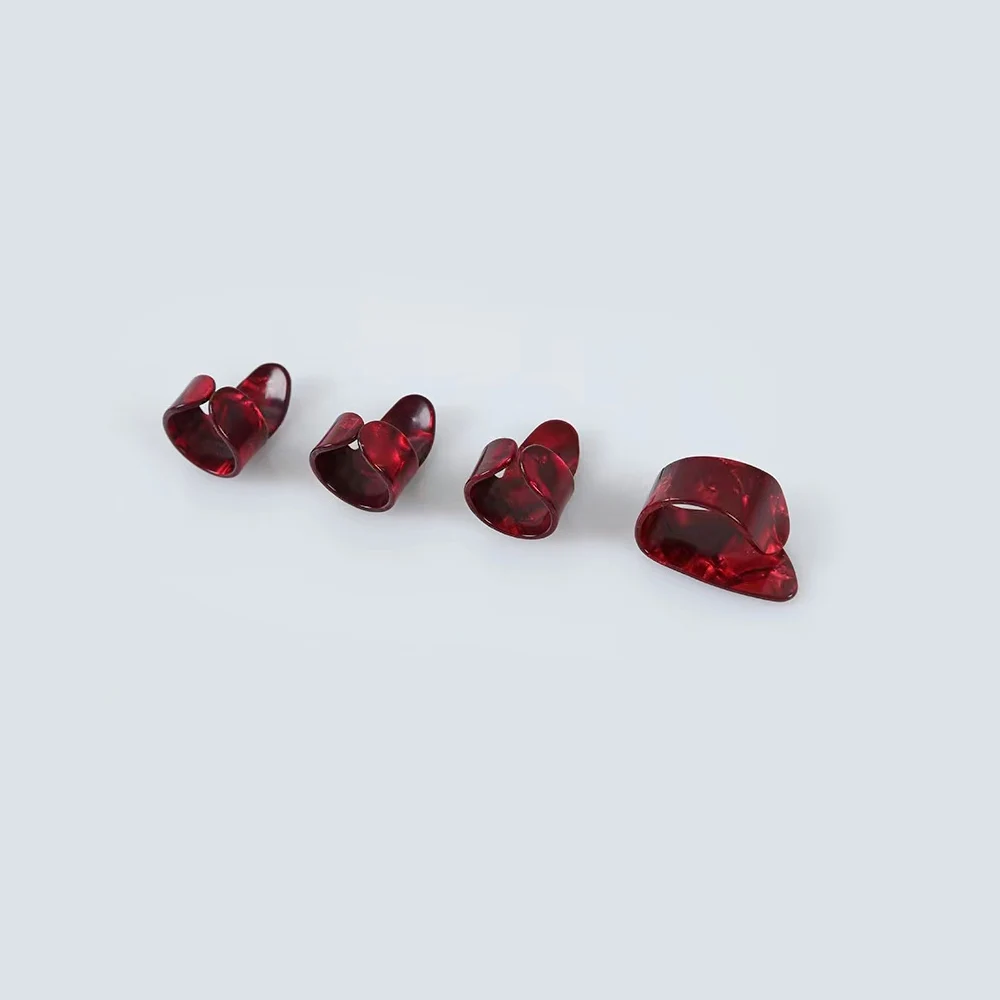 Description Picture 5 of item1 Set Guitar Picks 1 Thumb + 3 Finger Acoustic Nail Celluloid Jim Guitar Banjo Thumb Picks Plectrum for Guitar Accessories