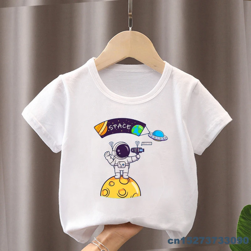 New Boys Tshirt Cute Astronaut Flying Paper Plane In Space Cartoon Print Kids Clothes Summer Girl Tshirts Funny Children Clothes