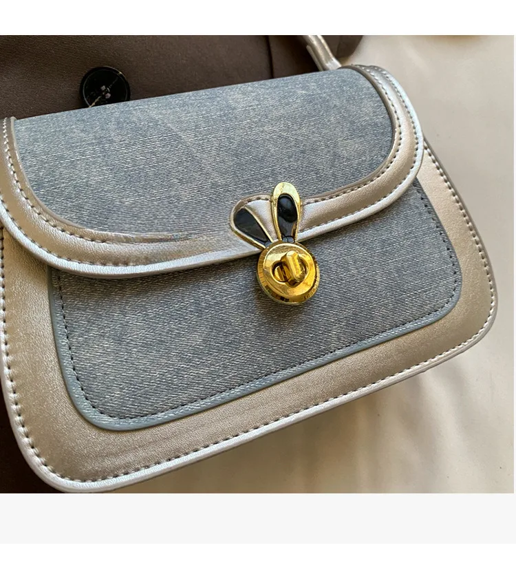 Texture denim saddle for women's 2024 summer new contrasting color lock buckle single shoulder bag, niche Western style_voghion.com