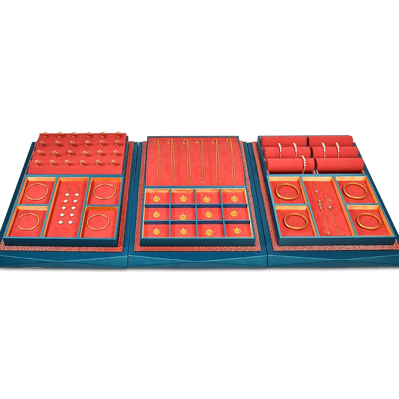 

Jinsky jewelry gold display trays red color embroidery earring pendant bangle display for counter table