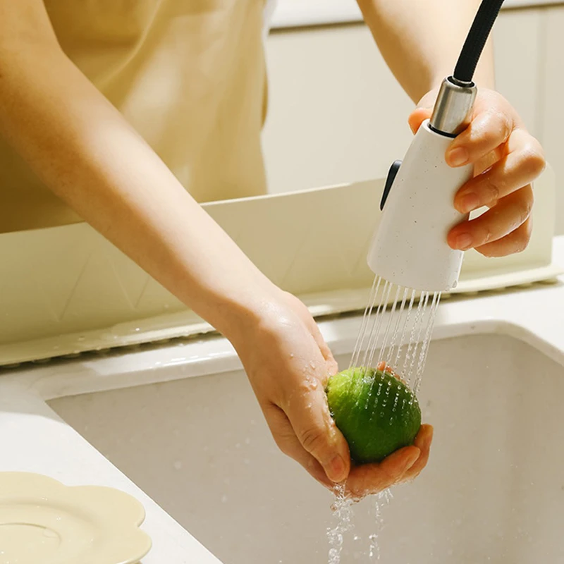 Spatscherm in gebruik keuken