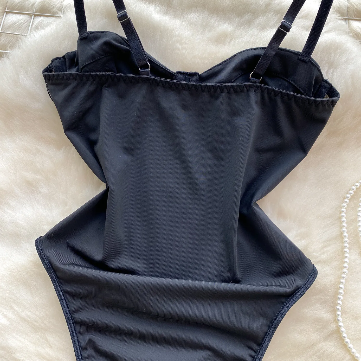 elegant black bodysuit styling detail