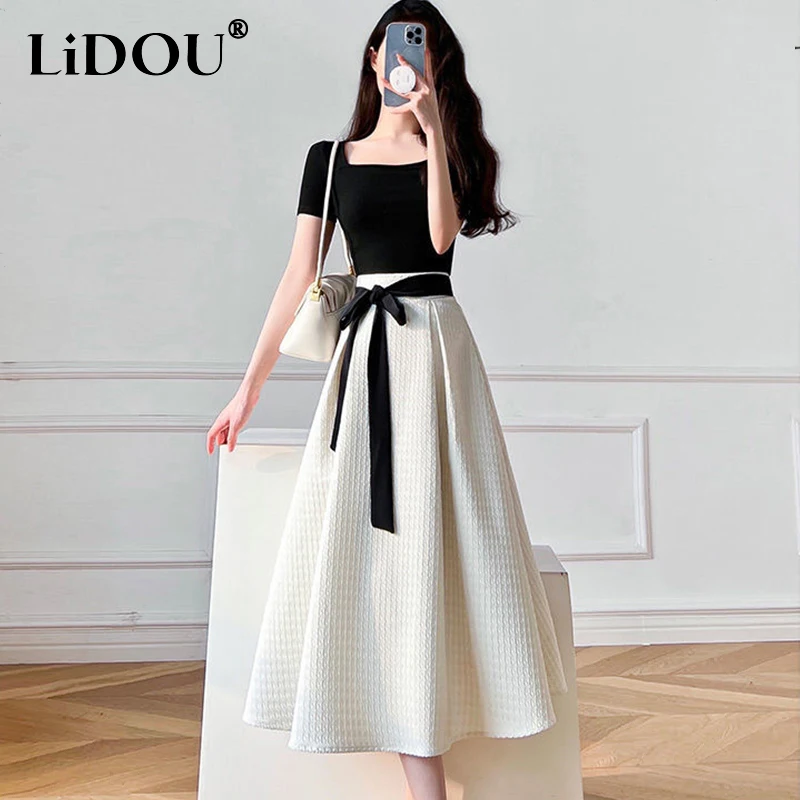 

2023 Summer Temperament O Neck Black Simple Lace Up T-shirt High Waist Elegant Fashion Pleated Skirts Set Suit Women's Clothing