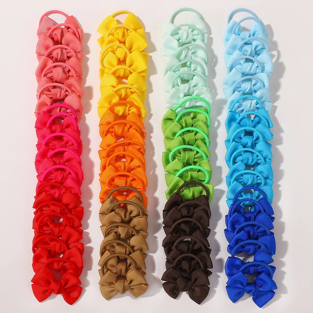50 יחידות צבע אקראי סרטי שיער לילדות סרטי שיער גמישים לילדות קשת גומי אביזרי תינוקות