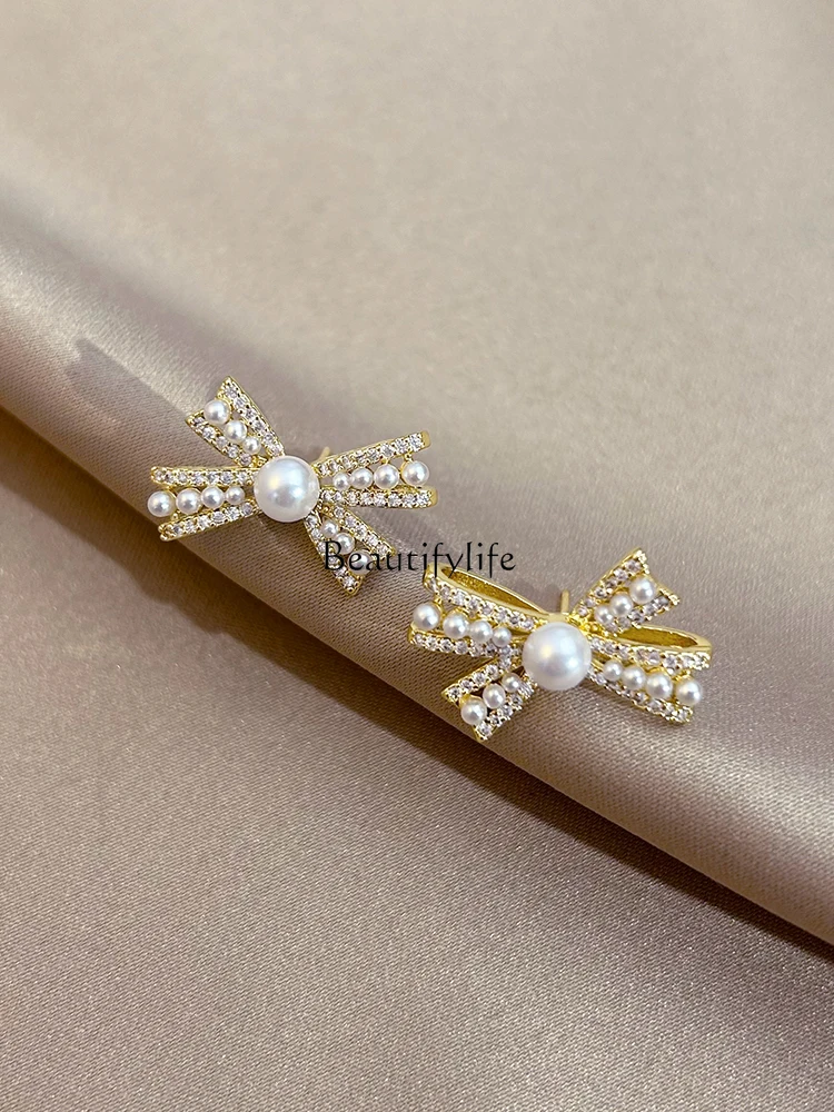 

Gold Bow Pearl Stud Earrings Special-Interest Design Sterling Silver Temperamental Earrings