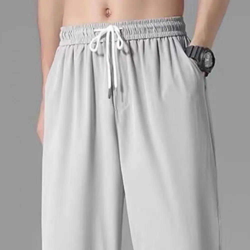 

Men Summer Sweatpants Elastic Waist Drawstring Pockets Solid Color Wide Leg Loose Soft Breathable Casual Ankle Banded Trousers