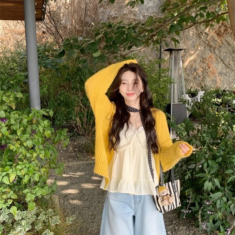 Autumn New Women's Loose Long-sleeved Cardigan Sweater Fashionable Women's Elegant Casual Knitted Hollow Versatile Top