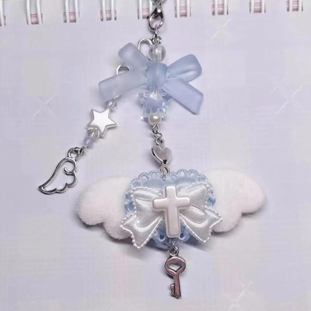 Bow and wings pendant phone chain detail