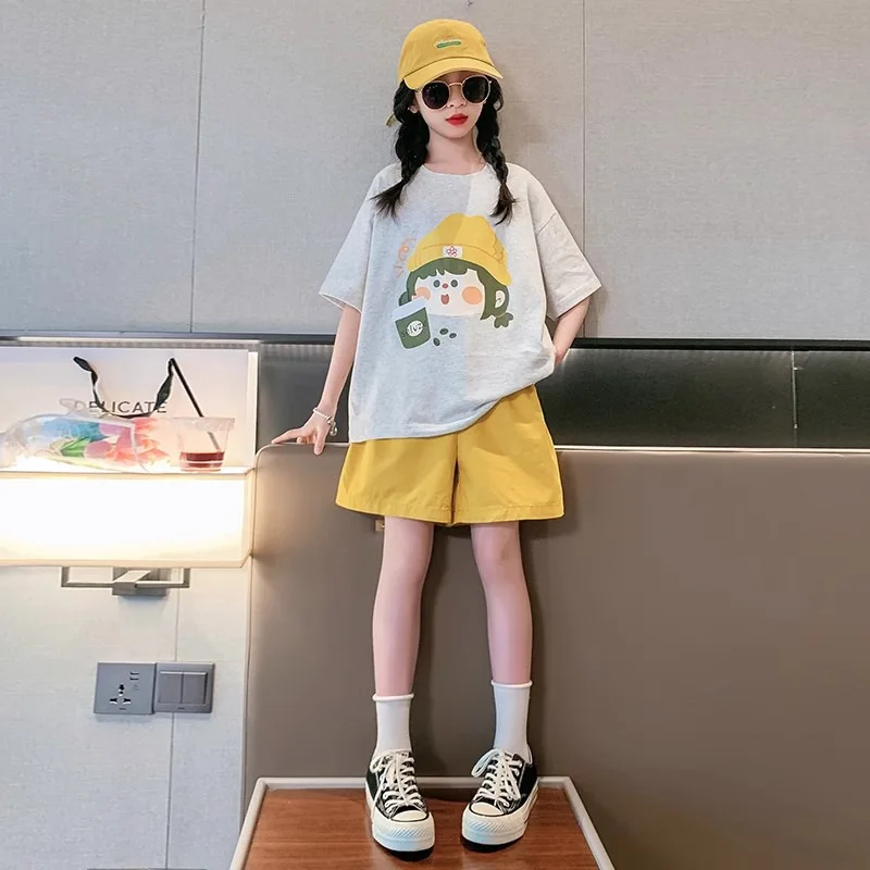 

Girls Summer Wear Cartoon T-shirt Short Sleeves + Shorts Two-piece Set New Fashionable Round Neck Tops and Quarter Pants Set