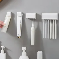 Toothbrush Holder Punch-free Wall-mounted Organizer Toothpaste Holder Oothpaste Dispenser Squeezer Bathroom Accessories 1