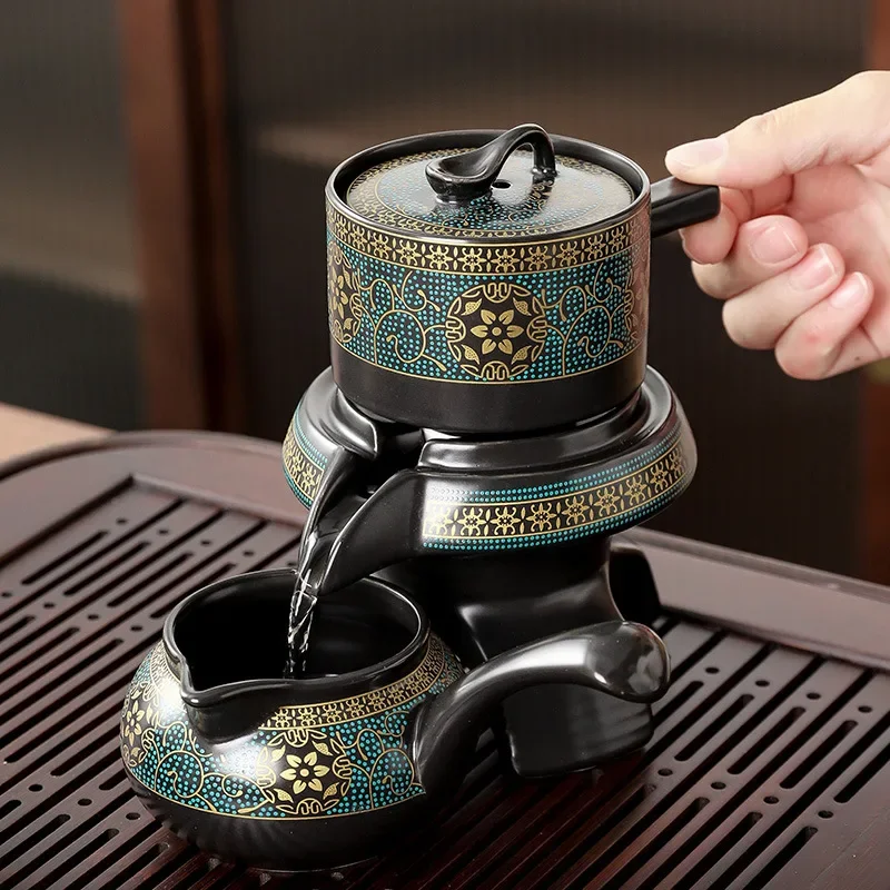 Creative Ceramic Tea Set with Rotating Teapot - طق...