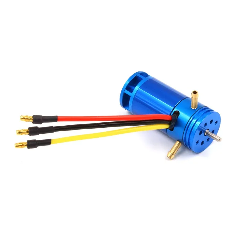 Moteur RC Brushless 2862 posé sur une surface blanche, avec connecteurs et câbles visibles.