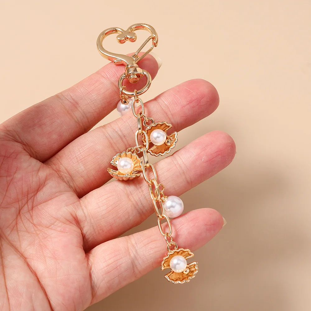 Aihua Fashion Sommer Strand Muschel Schlüsselanhänger Perlenbesetzter Schlüsselring Anhänger für Frauen Mädchen Handtaschen-Deko DIY Schlüsselanhänger Schmuck