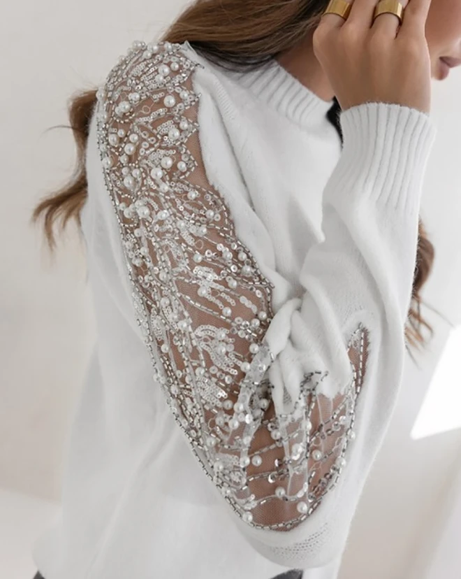 Рисунок 6 - Женский трикотажный свитер с длинными рукавами